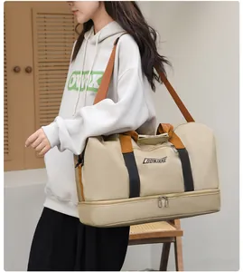 Detalle de bolsa de viaje grande con compartimento para zapatos y tela de alta densidad