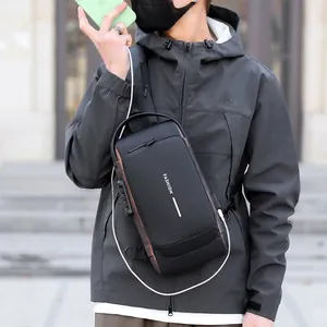 Sacoche bandoulière noire pour homme avec port de charge USB et serrure antivol robuste