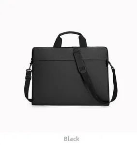 Detail view of black waterproof laptop bag with adjustable shoulder strap and sturdy handle