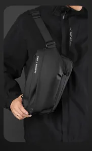 Detail of the waterproof matte fabric and fashion bag print on a black chest pack