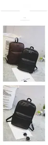 Detail of premium PU leather backpacks in black and brown with metal zipper and front pocket