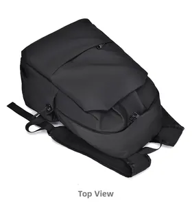 Top view detail of durable black business backpack showing the sturdy handle and texture
