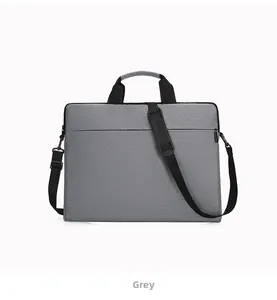 Front view of a grey slim laptop bag showing fabric texture and adjustable shoulder strap