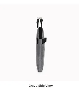 Slim gray waterproof oxford laptop bag side view with black handle and zipper detail