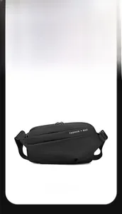 Detail view of water-resistant matte fabric and fashion bag lettering on crossbody pack