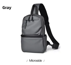 Detailed view of the gray waterproof crossbody chest bag with adjustable strap and pockets