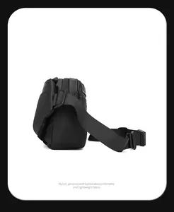 Side view of black crossbody messenger bag showing the thick structure and matte fabric