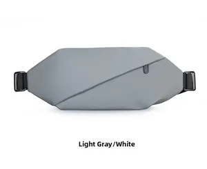 Front detail of water-resistant light grey sling bag with geometric texture and zipper