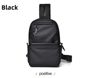 Front view of black waterproof crossbody chest bag with multi-compartment design