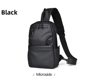 Detail view of black waterproof chest bag with dual zippers and breathable mesh strap