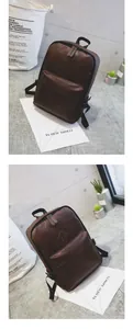 Detailed view of deep brown faux leather backpack with adjustable straps and front pocket