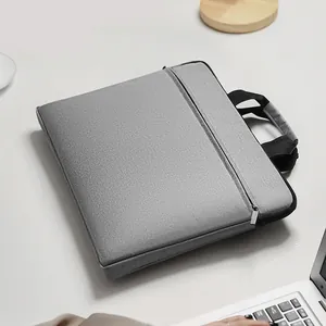 Slim grey waterproof laptop bag for 15.6 inch ultrabooks with shoulder strap and handles