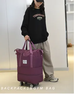 Détail du sac de voyage violet imperméable avec roues et compartiment à chaussures
