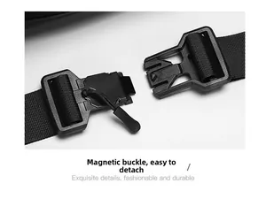 Detail of a black magnetic buckle with quick release pull cord for tactical sling bags