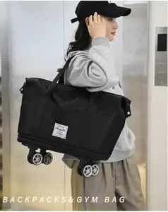 Détail d'un sac de sport noir polyvalent avec quatre roues pivotantes pour le voyage