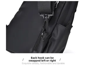 Detail view of water-resistant chest bag showing detachable hooks for left or right carry