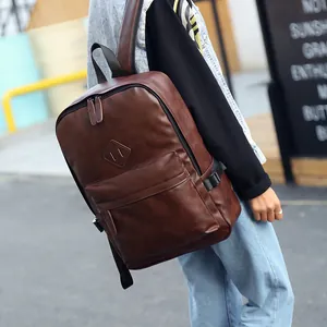 Classic dark brown PU leather backpack for men featuring a minimalist vintage travel style