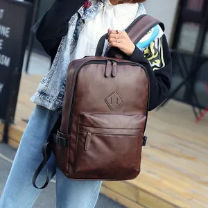 Men's retro dark brown PU leather backpack with front zipper pocket and diamond logo patch