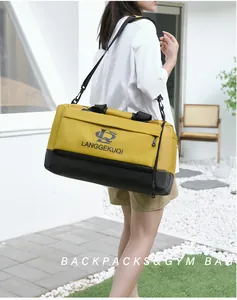 Detail of yellow sports gym bag with separate shoe compartment and durable nylon fabric