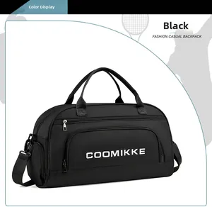 Detail view of black travel bag showing waterproof nylon fabric and shoulder strap