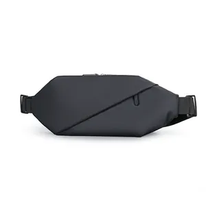 Waterproof black techwear crossbody bag with minimalist geometric design and adjustable strap