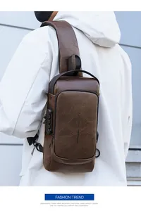 Detail of dark brown leather chest bag showing the secure 3-digit combination lock