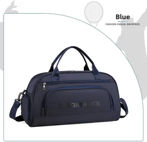 Blue duffel bag detail showing durable nylon fabric and shoulder strap attachment