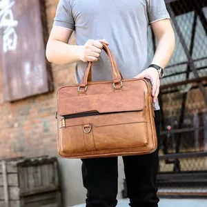 Men's vintage brown leather briefcase with dual handles and large front pocket