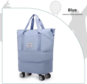 Detail view of foldable light blue travel bag with wheels and adjustable zipper layers