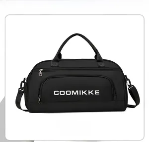 Front view of black fitness bag with adjustable strap and brand logo on white background