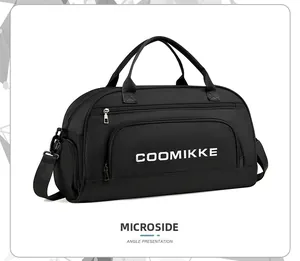 Side view of black travel duffle bag with COOMIKKE logo and separate shoe compartment
