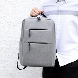 Grijze zakelijke laptoprugzak met USB-poort en waterbestendige stoffen laag