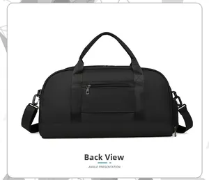 Rear view of black travel duffle bag showing back zipper pocket and shoulder strap