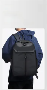 Close-up of lightweight black casual backpack showing water-resistant nylon material