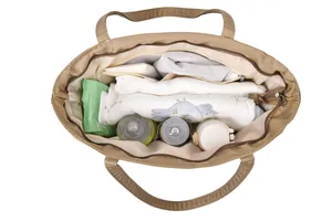 Interior view of large tote bag showing bottle holders and functional compartments