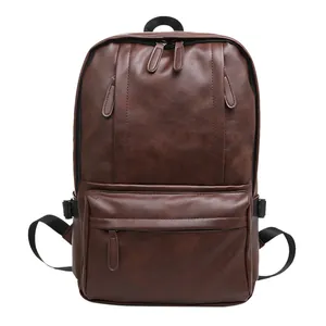 Sac à dos classique en cuir PU marron foncé pour hommes avec texture vintage et poche avant