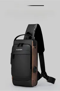 Detail of crossbody bag showing USB charging port and anti-theft security lock