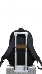Business backpack with rear luggage strap for secure attachment to suitcase handles