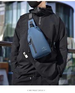 Close-up of blue waterproof chest bag with JUNZIDAISHU logo and sturdy plastic buckle
