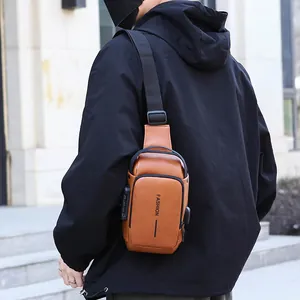 Zaino monospalla marrone da uomo con blocco antifurto e porta di ricarica USB
