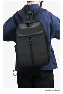 Rear view of a black minimalist business backpack featuring padded shoulder straps