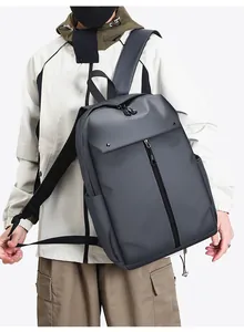 Detailed view of dark grey waterproof commuter backpack with vertical zipper pocket