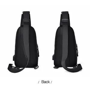 Rear view of black sling bag showing breathable mesh padding and integrated USB port