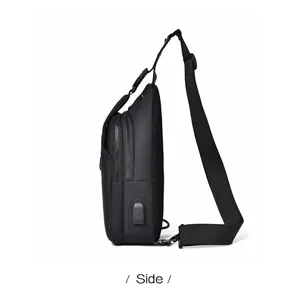 Side view of waterproof black men's sling bag with USB port and breathable mesh back