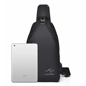 Waterproof black crossbody chest bag shown with an iPad for size reference