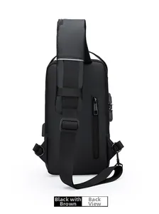 Back view of black and brown crossbody bag showing USB port and anti-theft pocket