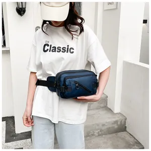 Deep blue nylon waist bag with multiple functional zip pockets and adjustable strap