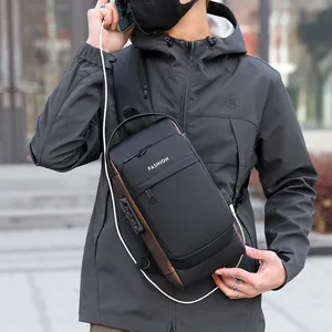 Waterproof black sling bag for men with anti-theft lock and USB charging port