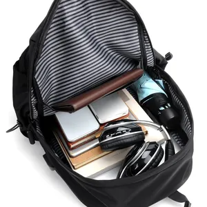 Black sporty backpack with large capacity main compartment and grey striped lining detail