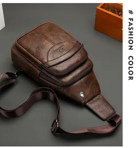 Macro view of brown vintage leather chest bag showing grainy texture and front zipper pocket